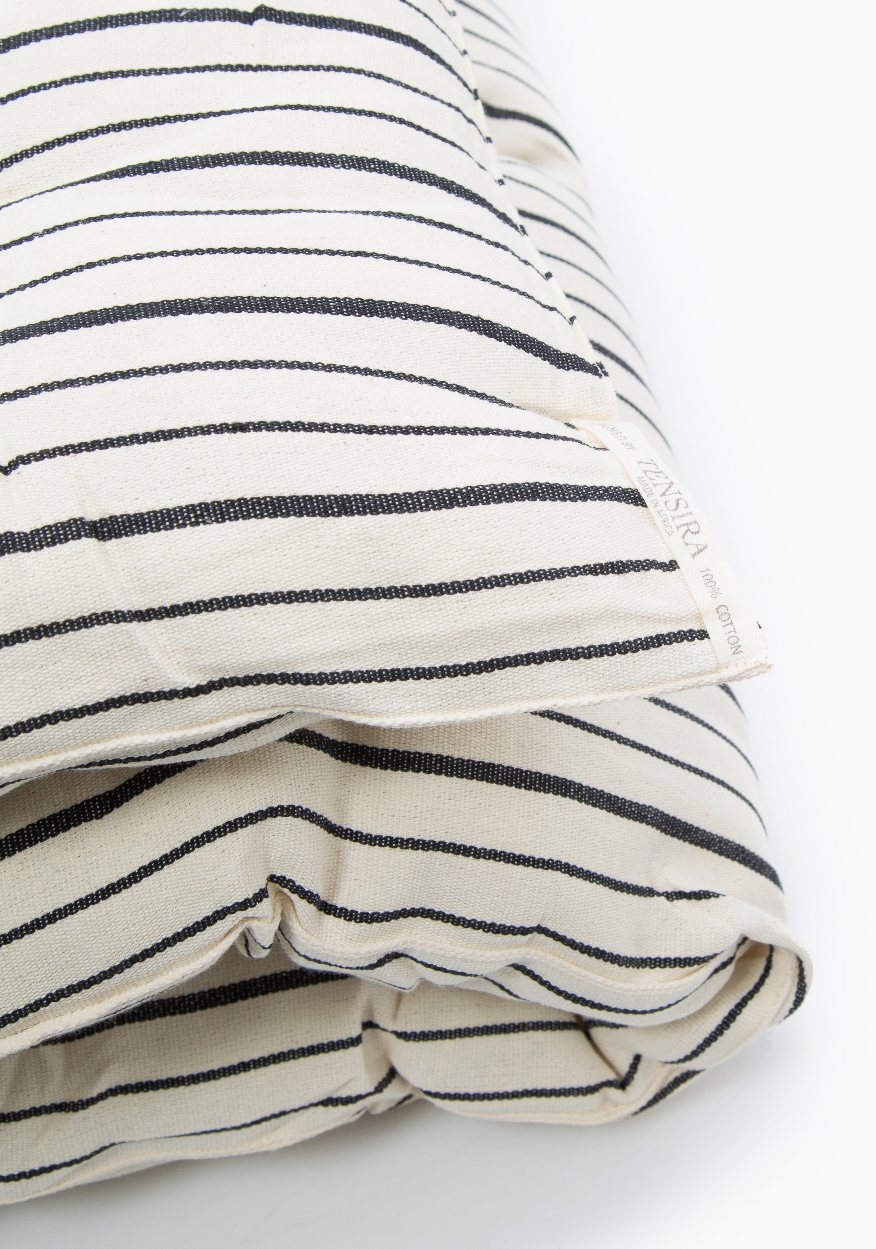 Sustainable and stylish bed roll from DIANI x Tensira, blending Kenyan and English influences in its design and craftsmanship.