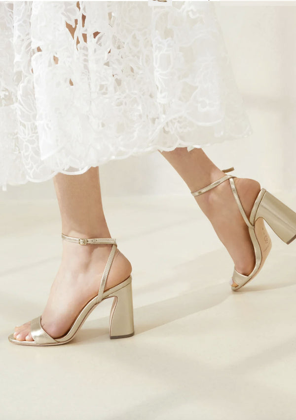 Malia Curved-Heel Sandal | Champagne