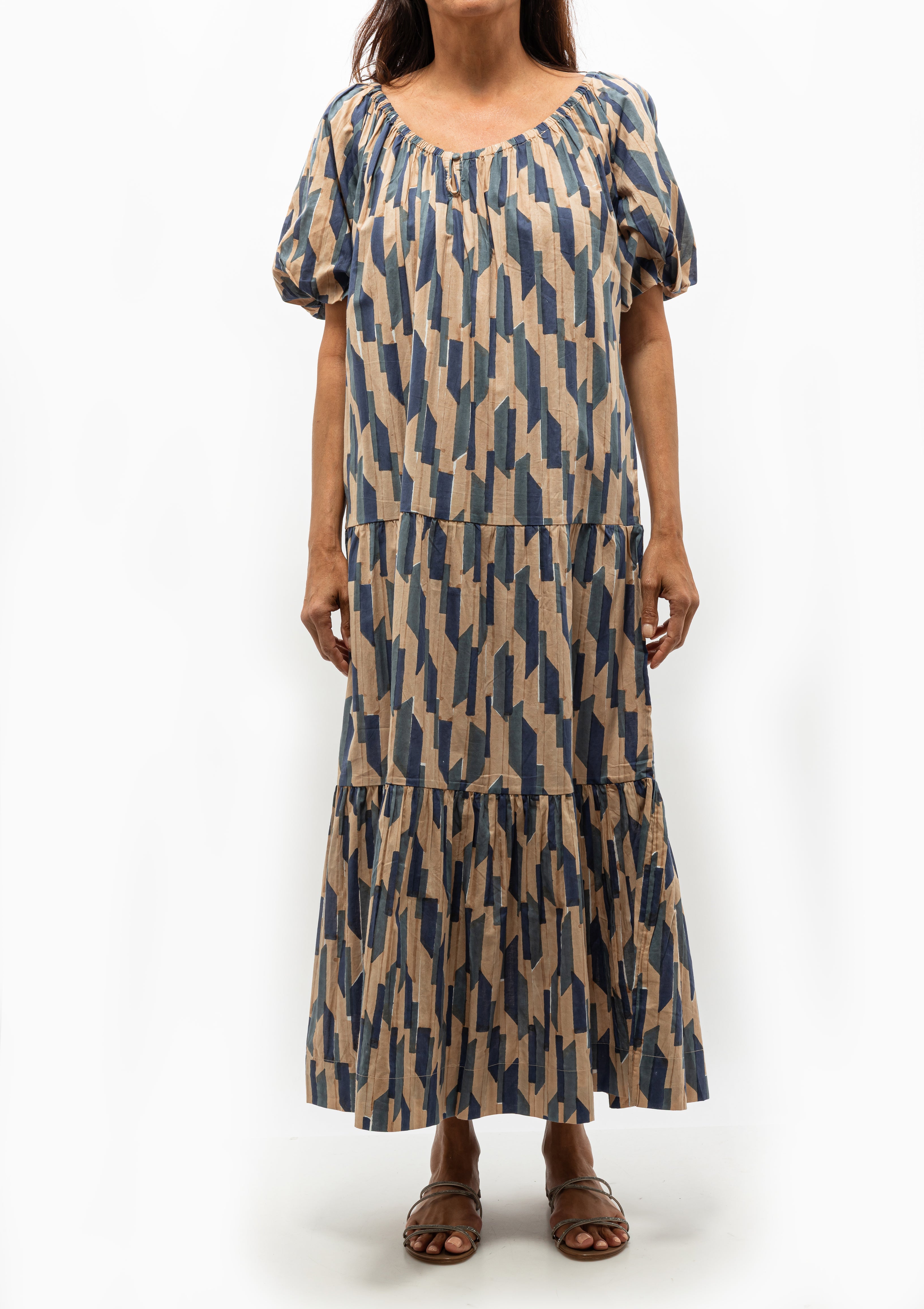 Romantic and versatile, the Mirth Capri Dress in Cerulean Rainfall is effortless fashion. Worn with or without the sash. Available at Diani Boutique.