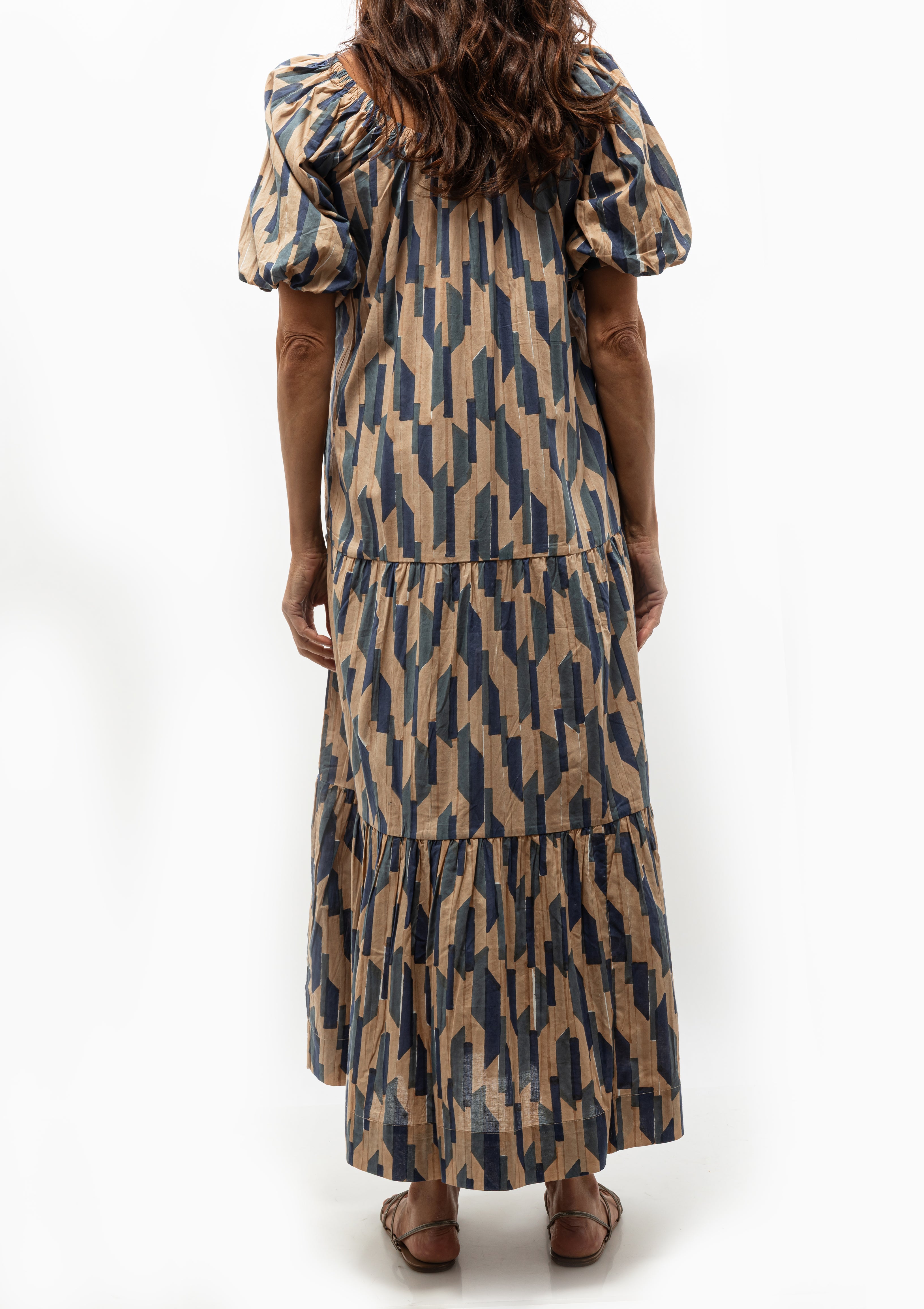 Romantic and versatile, the Mirth Capri Dress in Cerulean Rainfall is effortless fashion. Worn with or without the sash. Available at Diani Boutique.