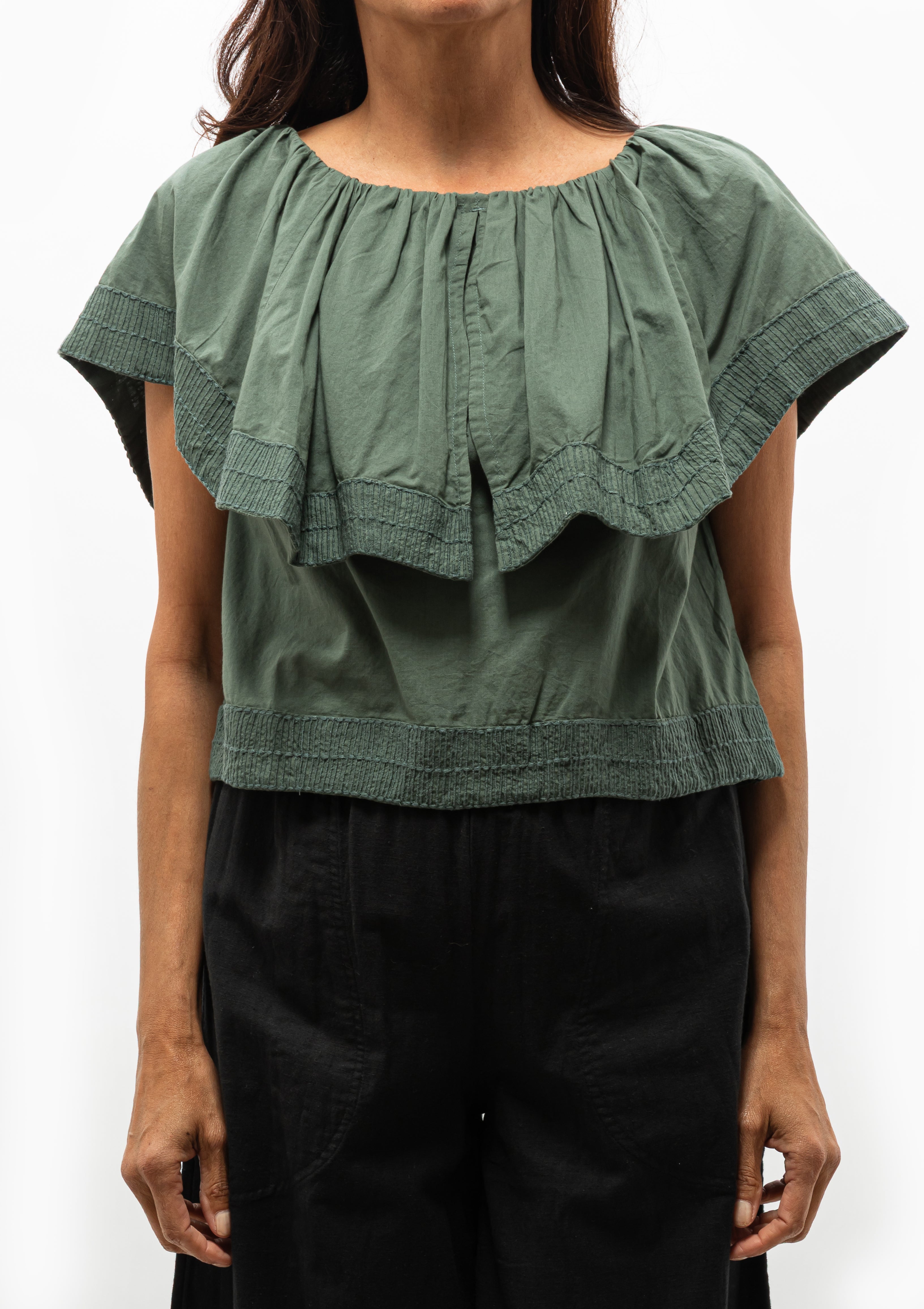 Mirth's Pondicherry Top in Verde Fossil is perfect with a Mirth Pant, jeans, or a skirt. Available at Diani Boutique.