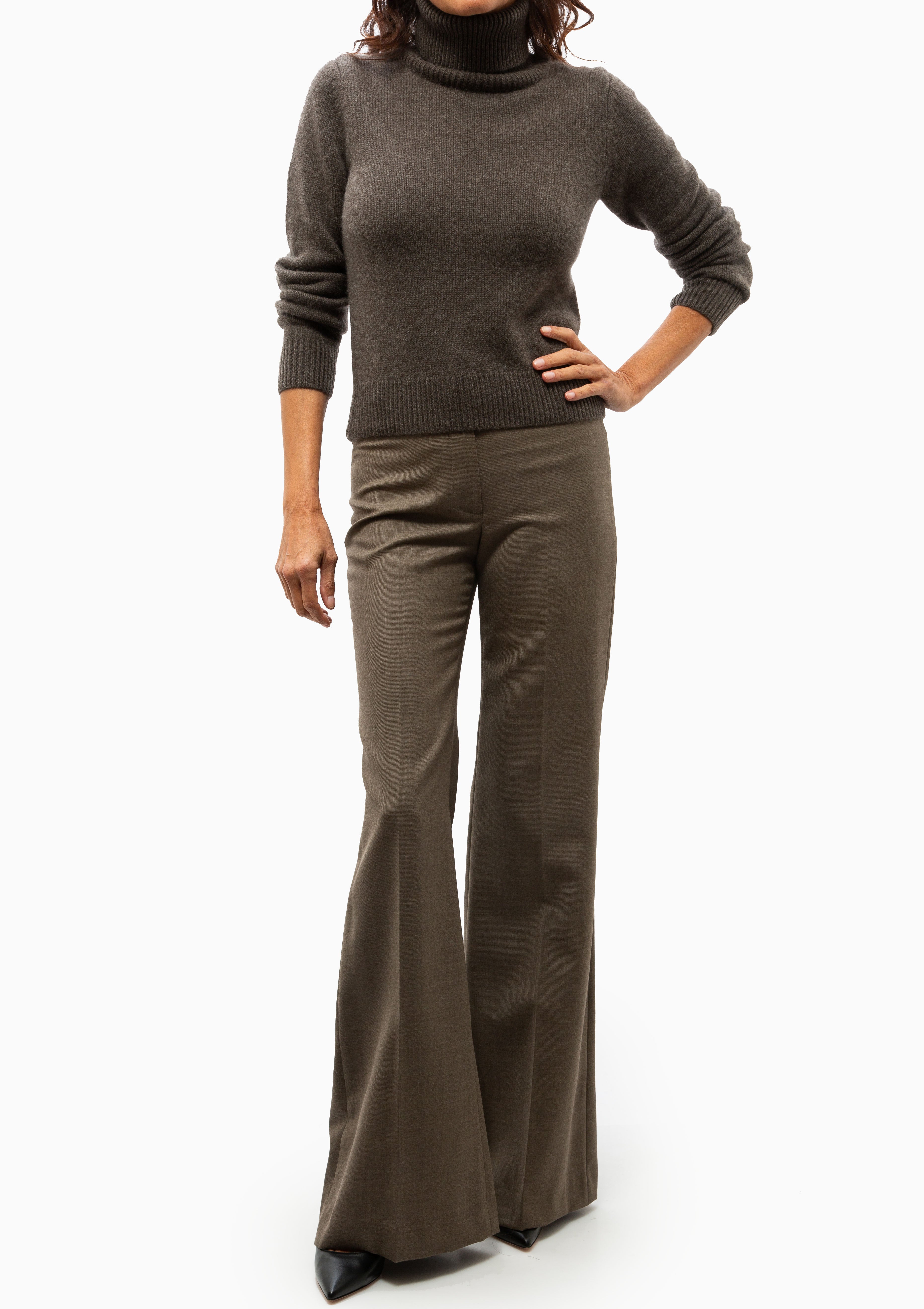 Nili Lotan Hollyn Sweater in Dark Umber worn with brown wide leg trousers Available at Diani.