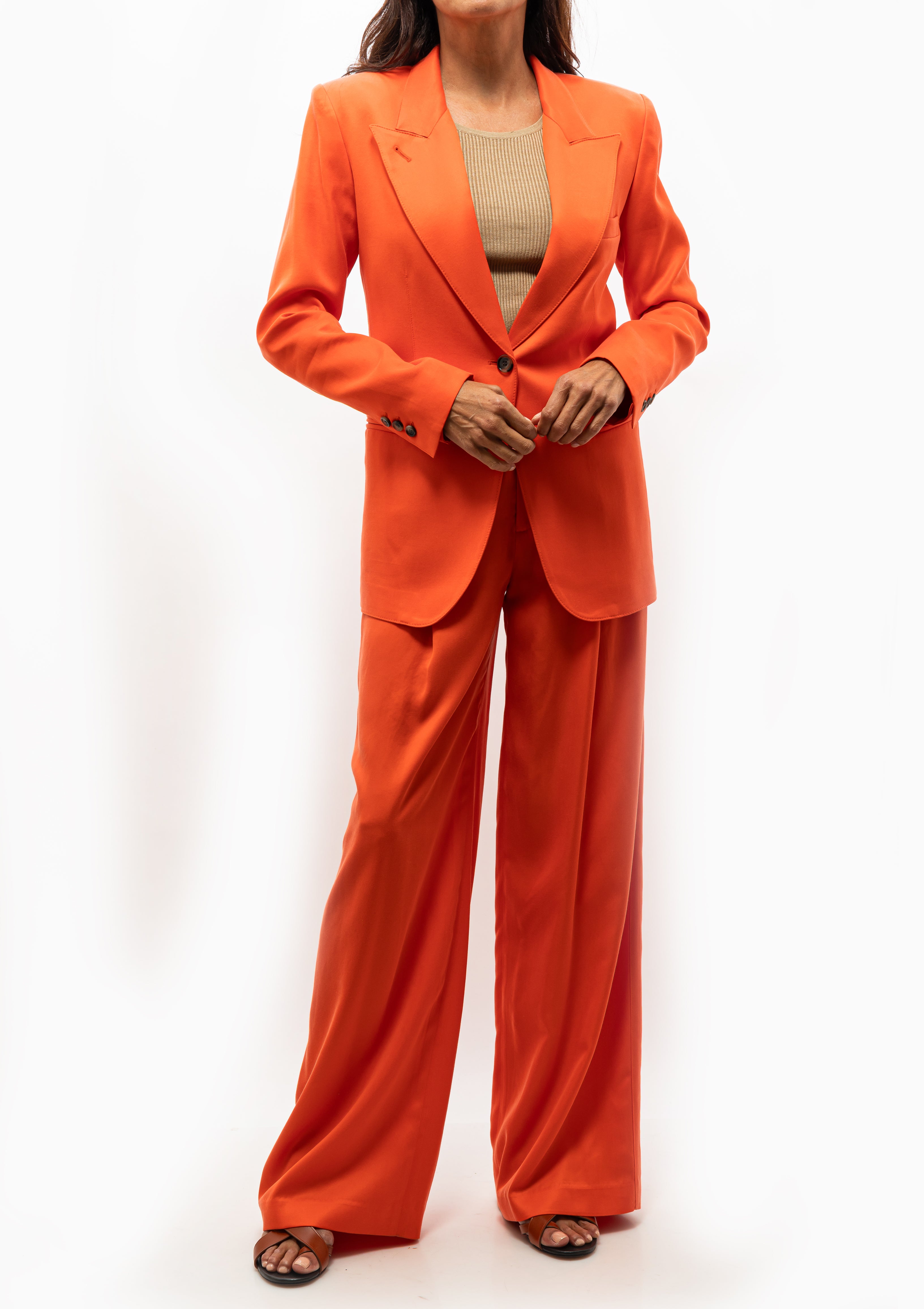 Close-up of  the Smythe 90's Blazer in Vermillion, styled with tan ribbed top. Available at Diani Boutique.