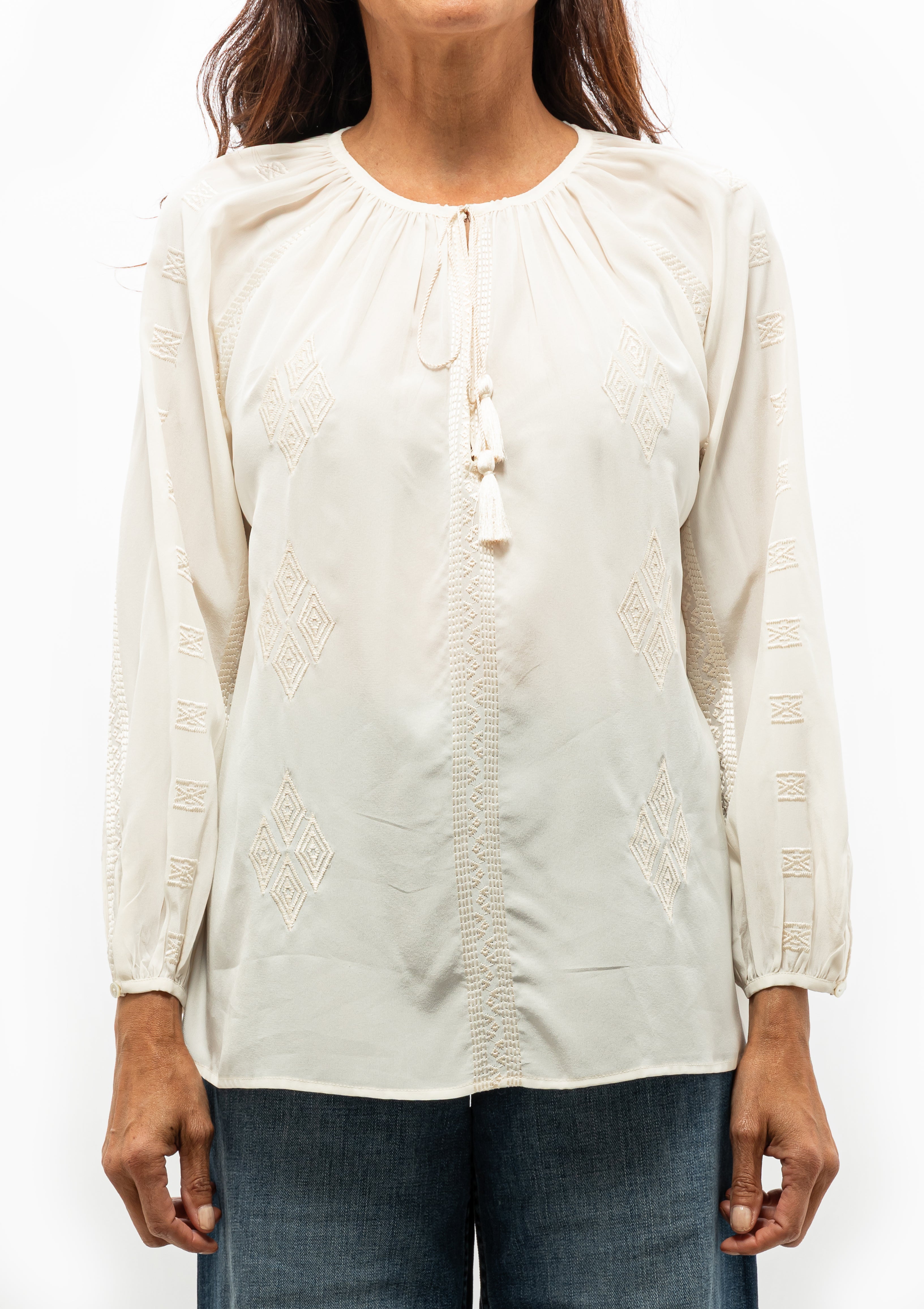 Timeless ivory silk Cristo Blouse by Nili Lotan, perfect for elevated looks — available at Diani Boutique.