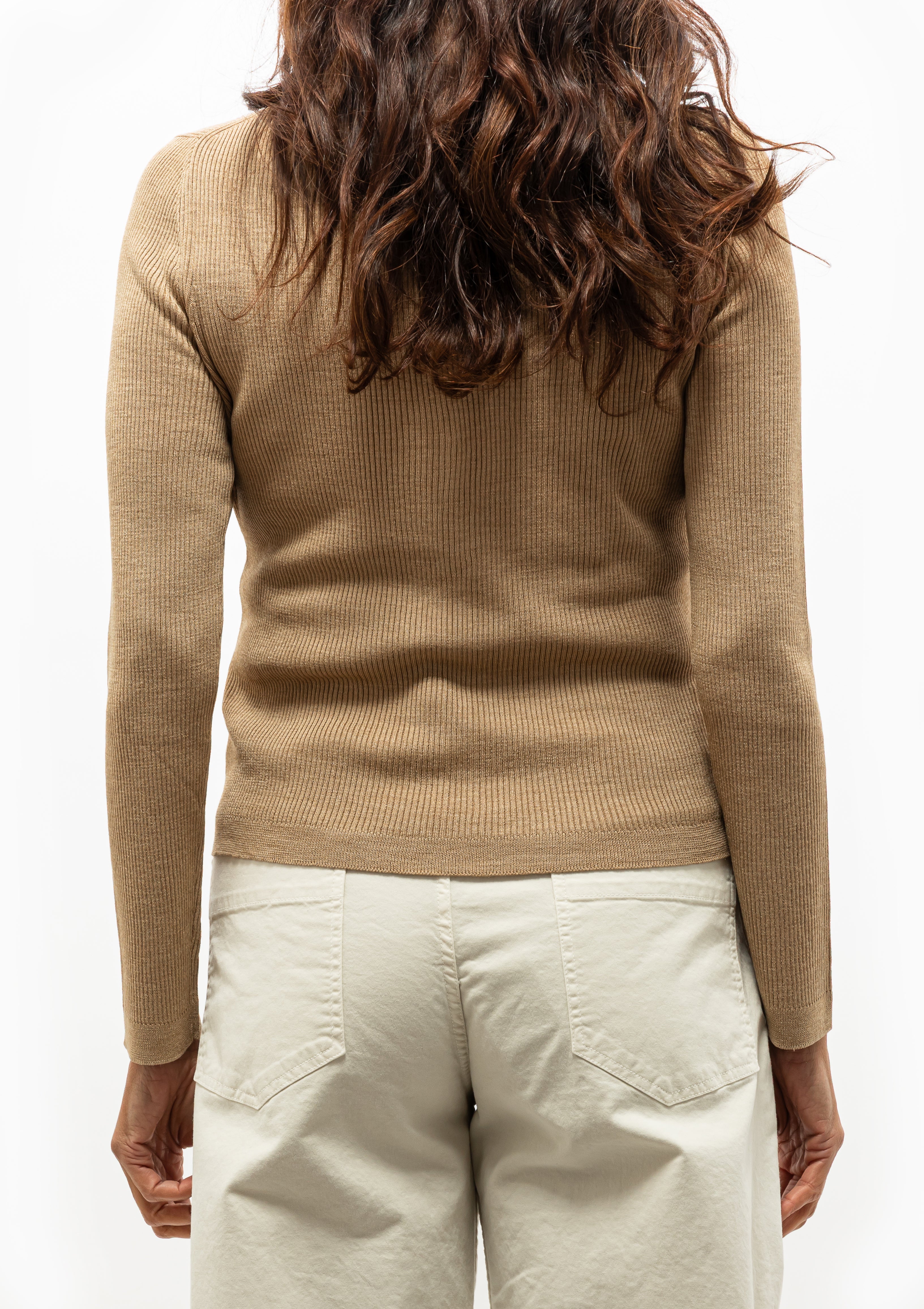 Elegant fine gauge silk Nari cardigan with horn buttons, paired effortlessly with Tribeca Pant in Stone. Available at Diani Boutique.