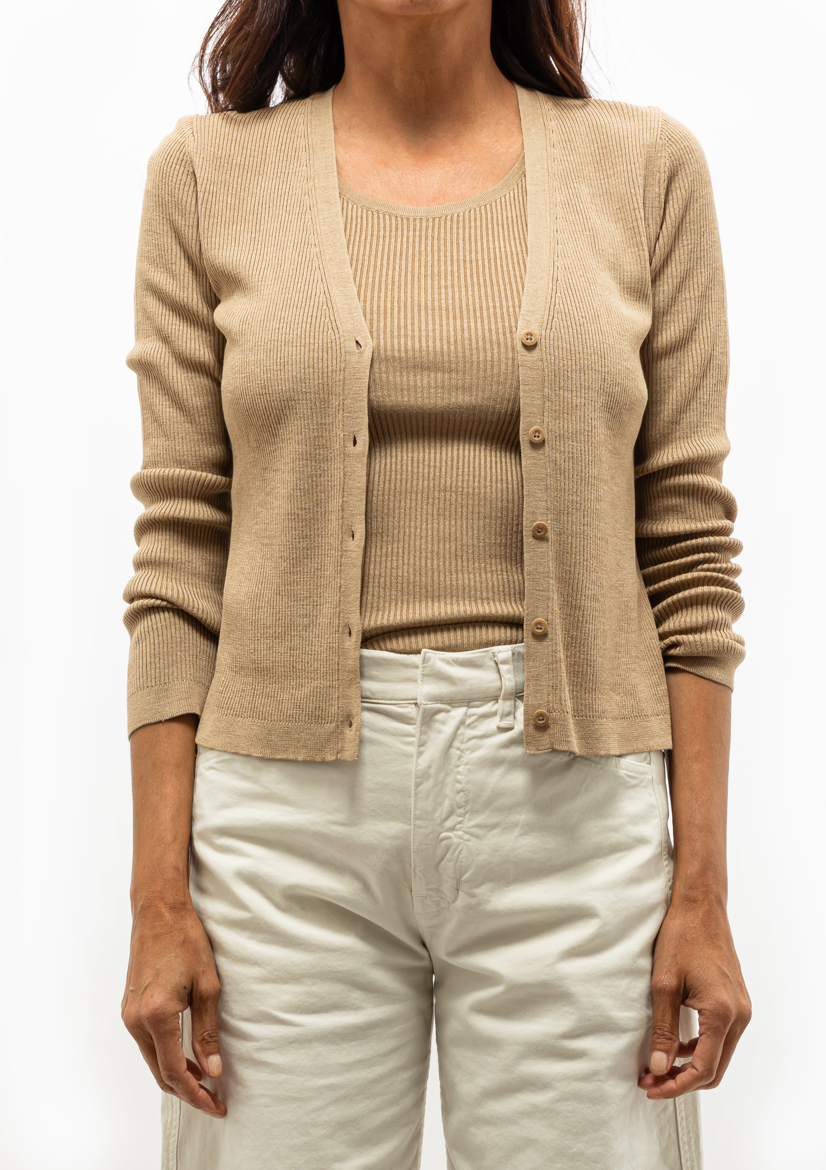 Silk fine gauge rib Nari cardigan with small buttons, paired with Tribeca Pant in Stone, available at Diani Boutique.