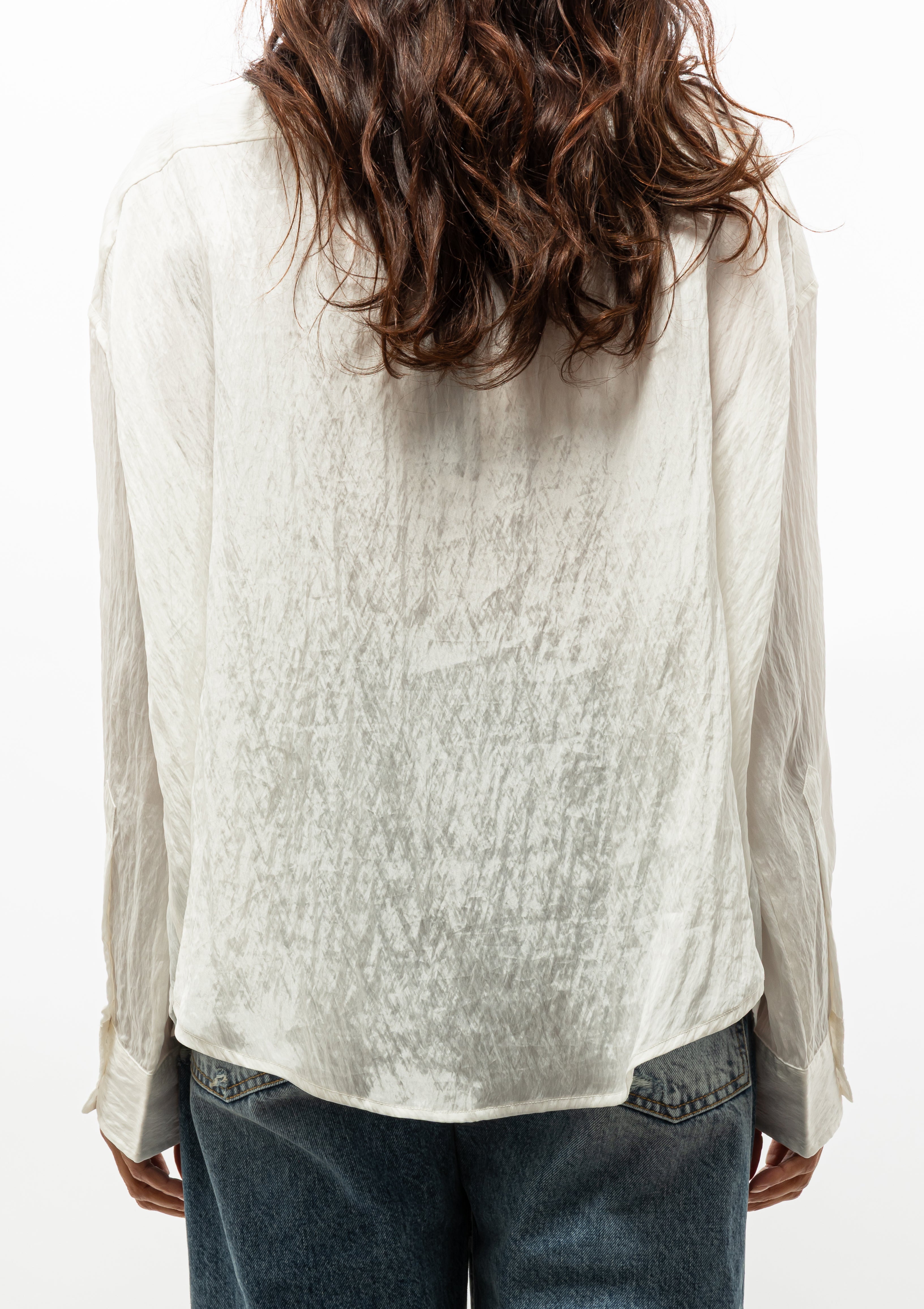 Unique and lightweight Twisted Neck Shirt by R13 in white lyocell, shown with— shop at Diani Boutique.