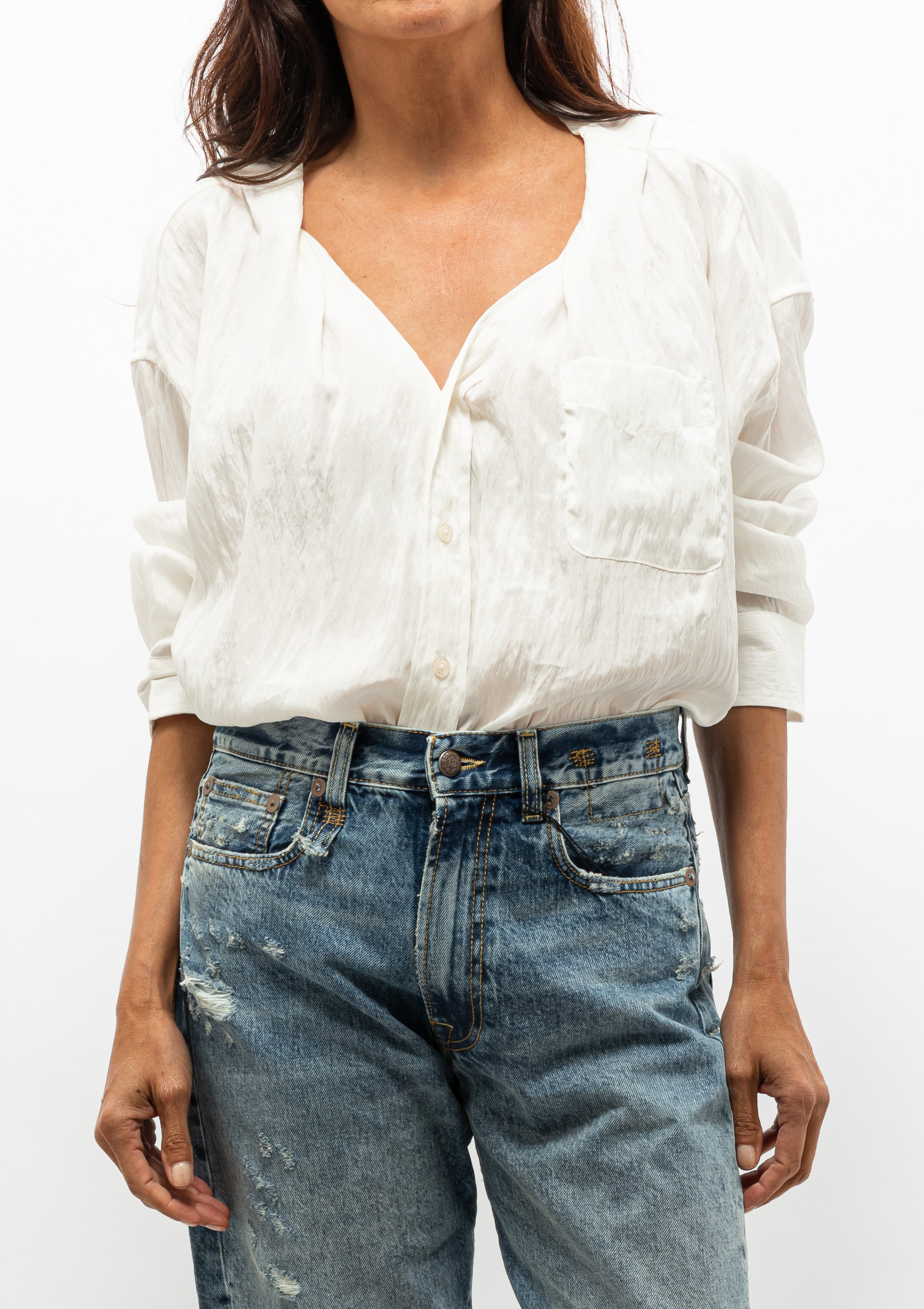 Unique and lightweight Twisted Neck Shirt by R13 in white lyocell, shown with the R13 Boyfriend Jean— shop at Diani Boutique.