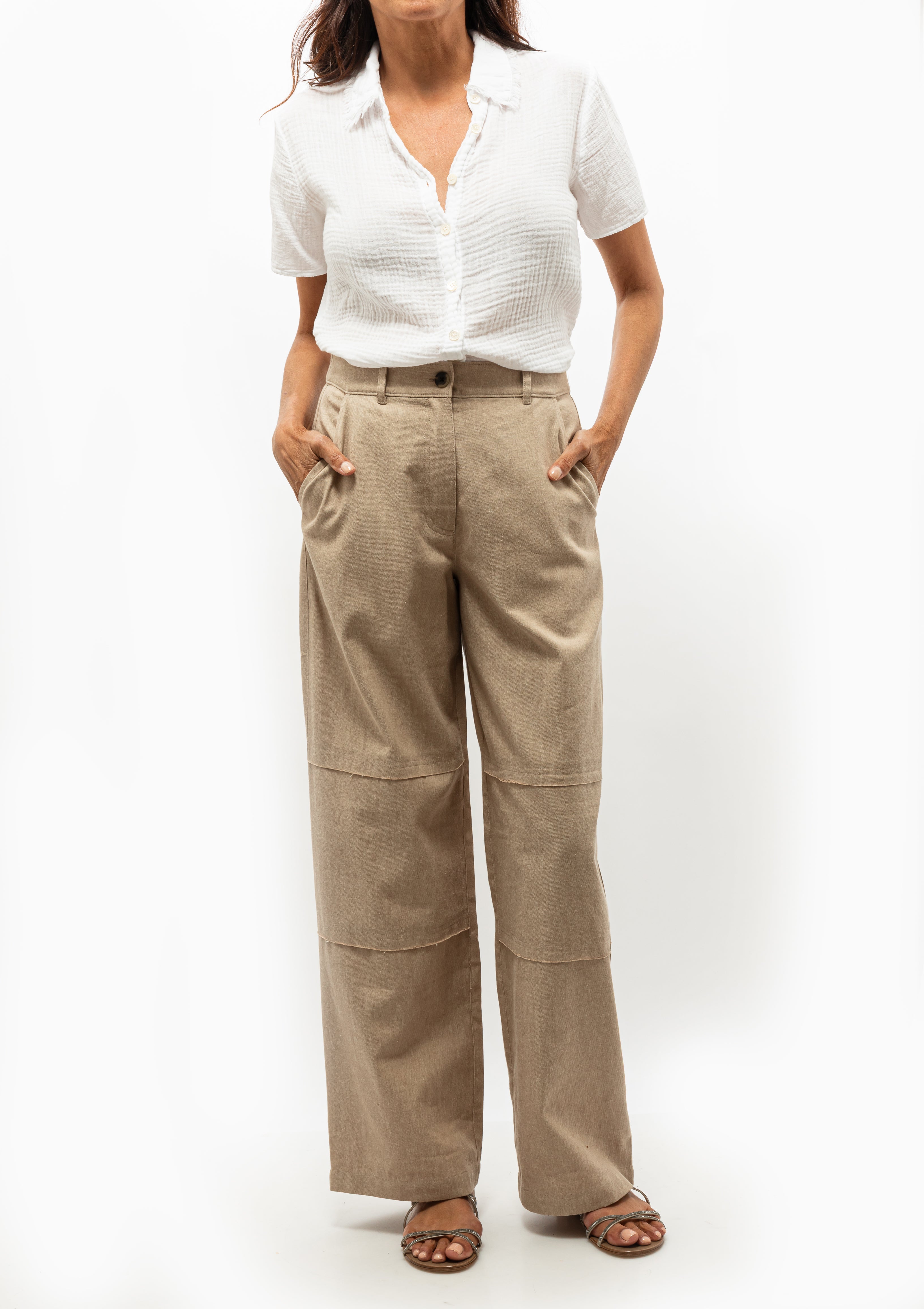 The Raquel Allegra Cotton Linen Arden pant shown with the Pedro Garcia Panie sandal, are lightweight for warm weather. Available at Diani Boutique.
