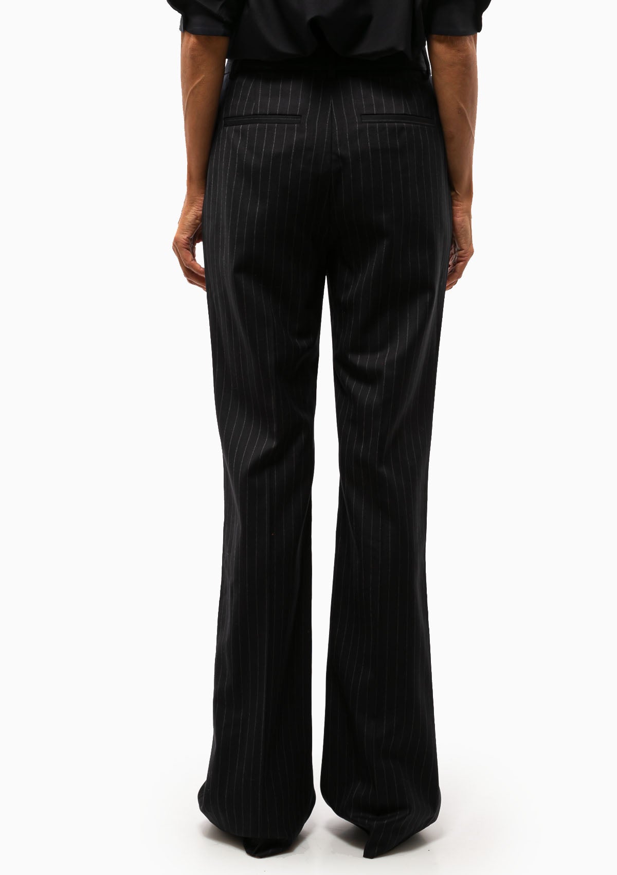 Nili Lotan Corette Pant in Navy Pinstripe. Available at Diani.