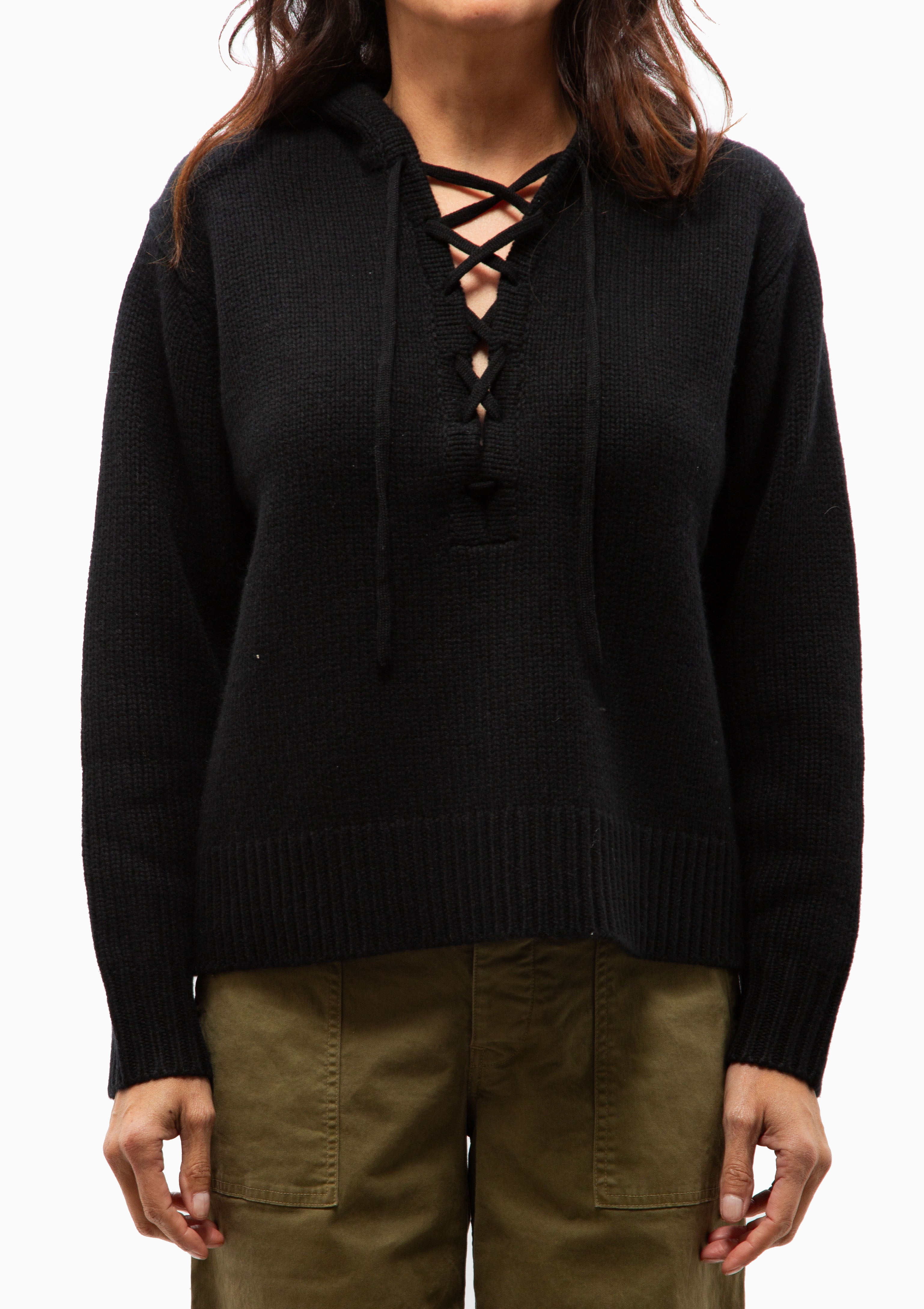 Close up of the Noemi Sweater in Black. Available at Diani.