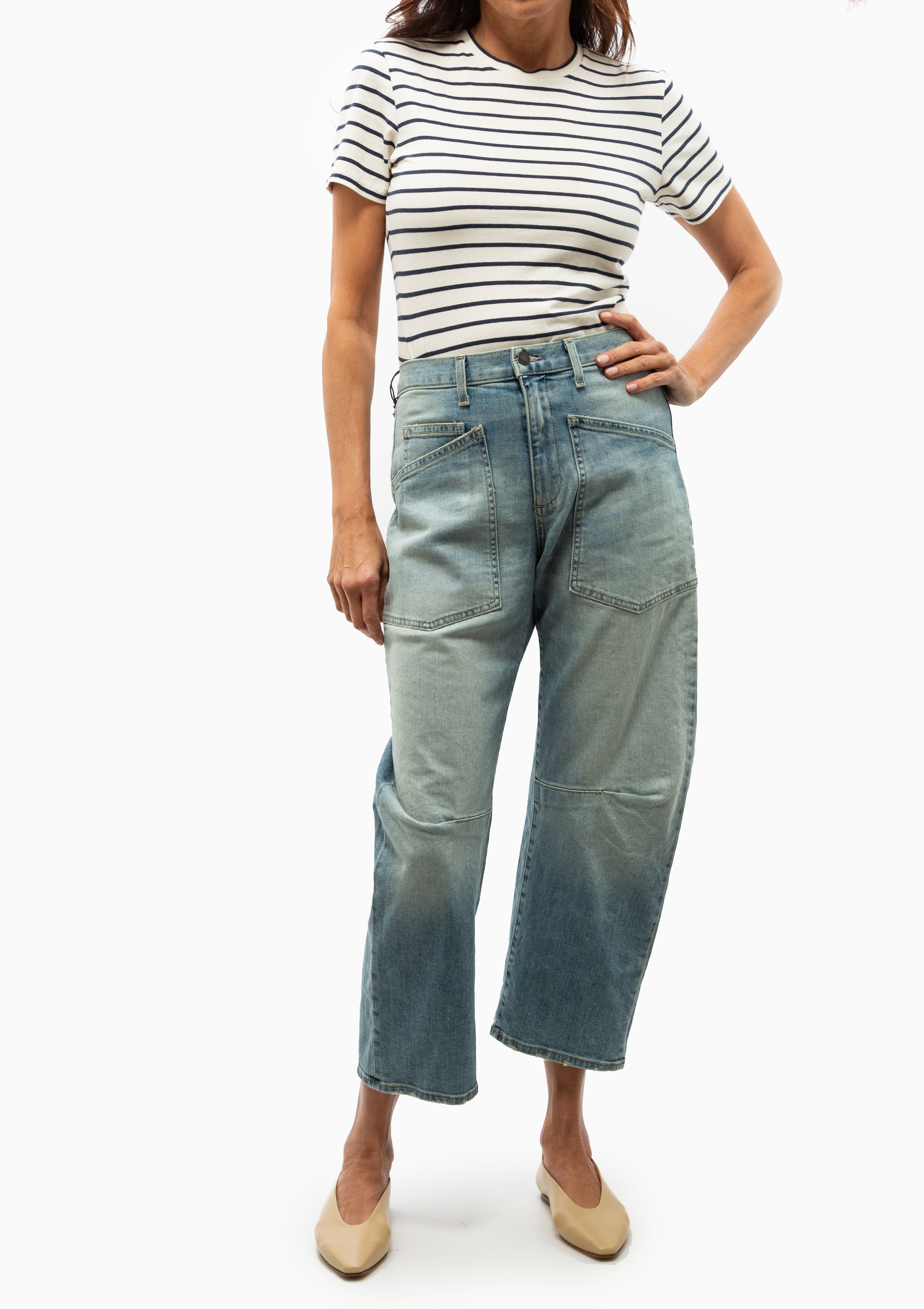 Nili Lotan Shon Jean Summer Wash. Shown with the Betty Flat in Latte Color by Aeyde. Available at Diani.