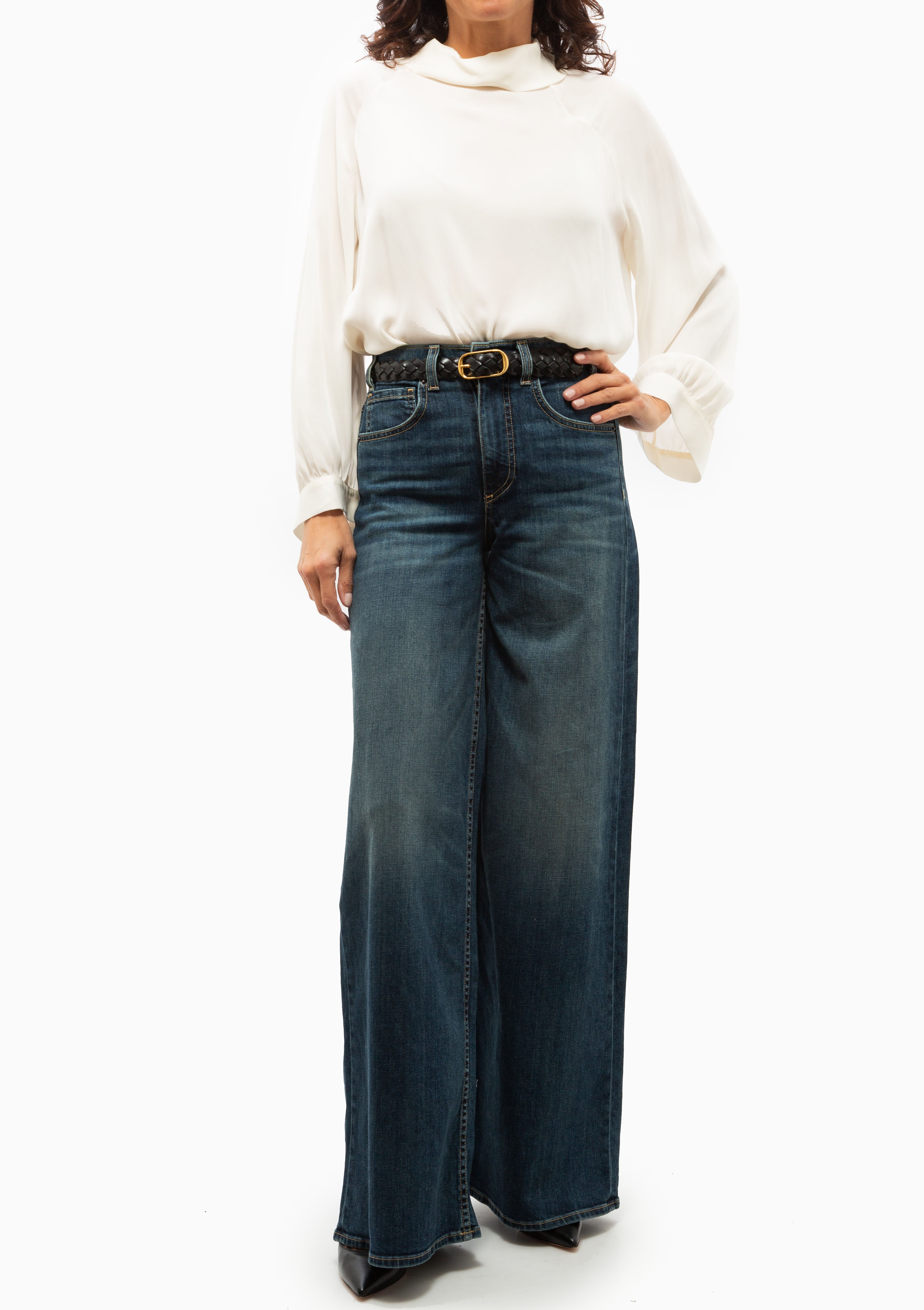 Nili Lotan Rolland Jean in Simon Wash. Shown with the Eliana Top in Ivory. Available at Diani.