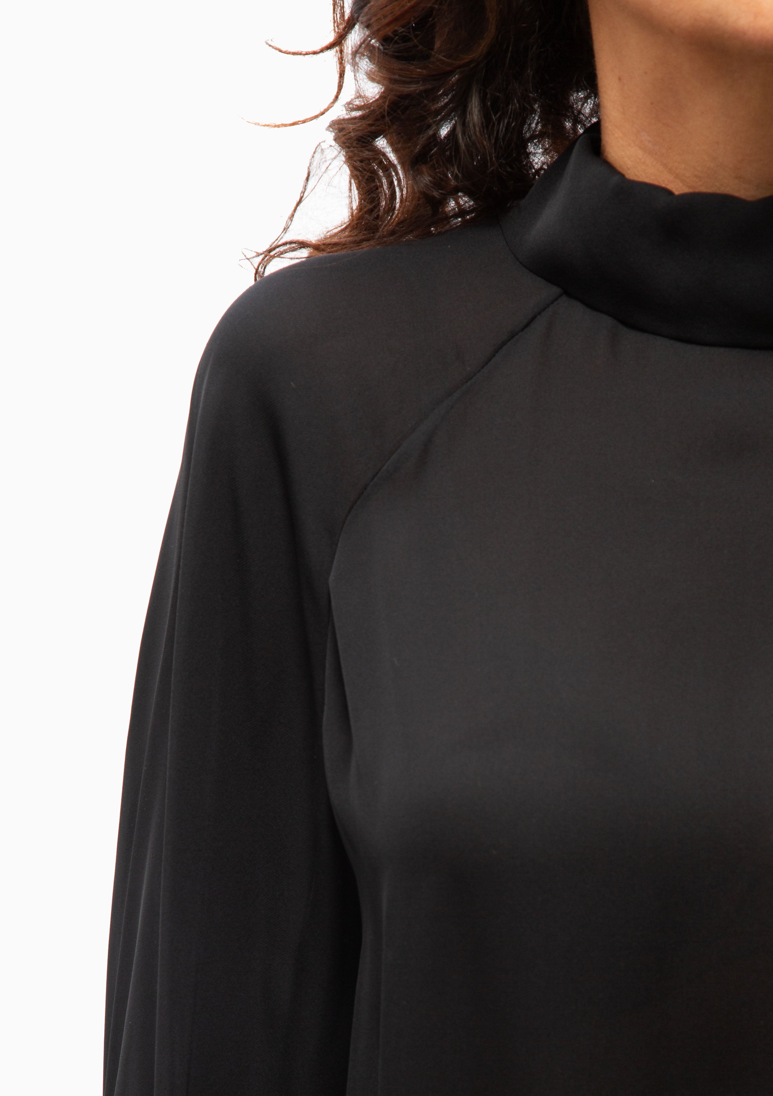 Nili Lotan Eliana top in black. Available at Diani.