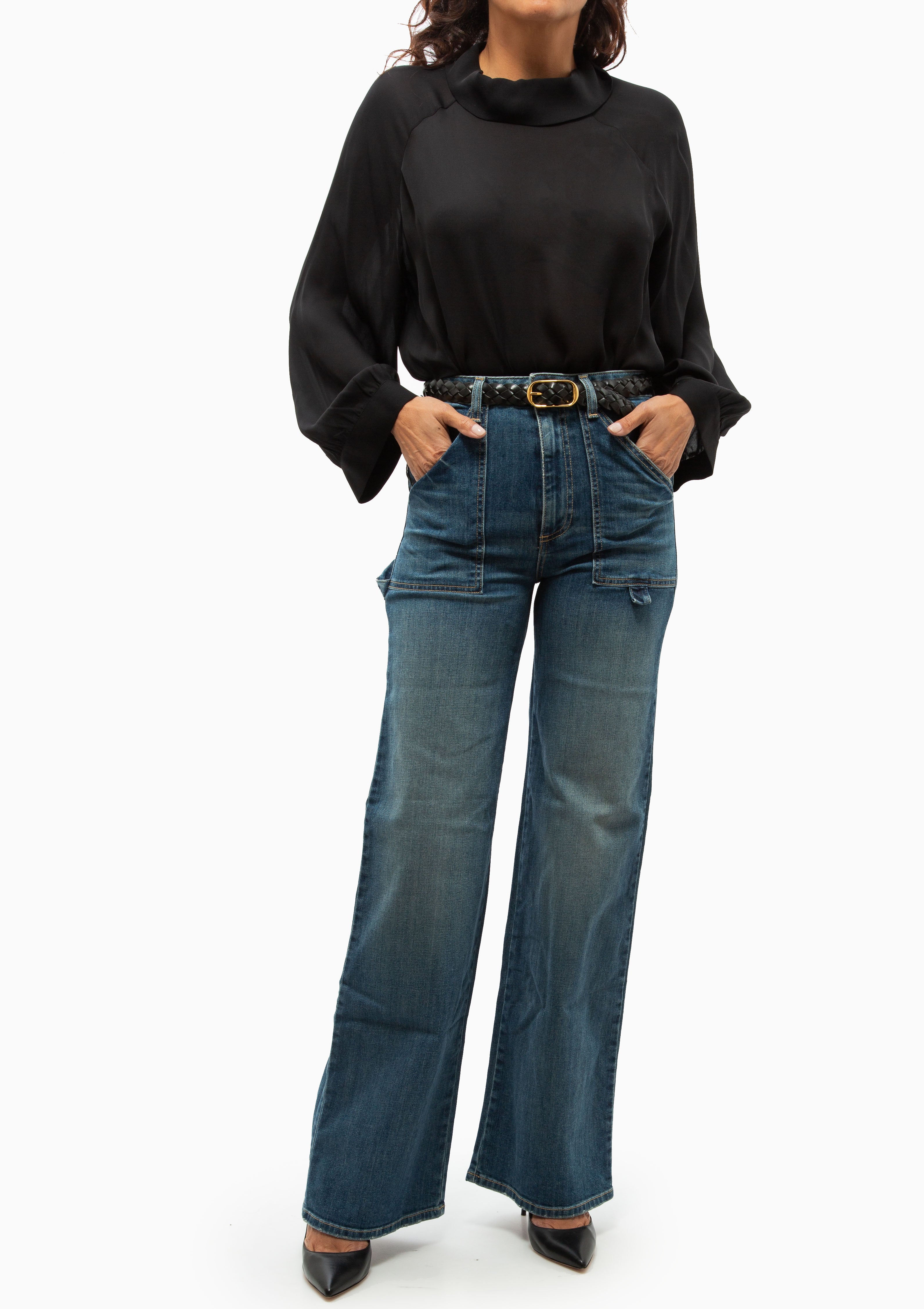 Nili Lotan Eliana Top in black. Shown with the Quentin Jean in Classic Wash. Available at Diani.