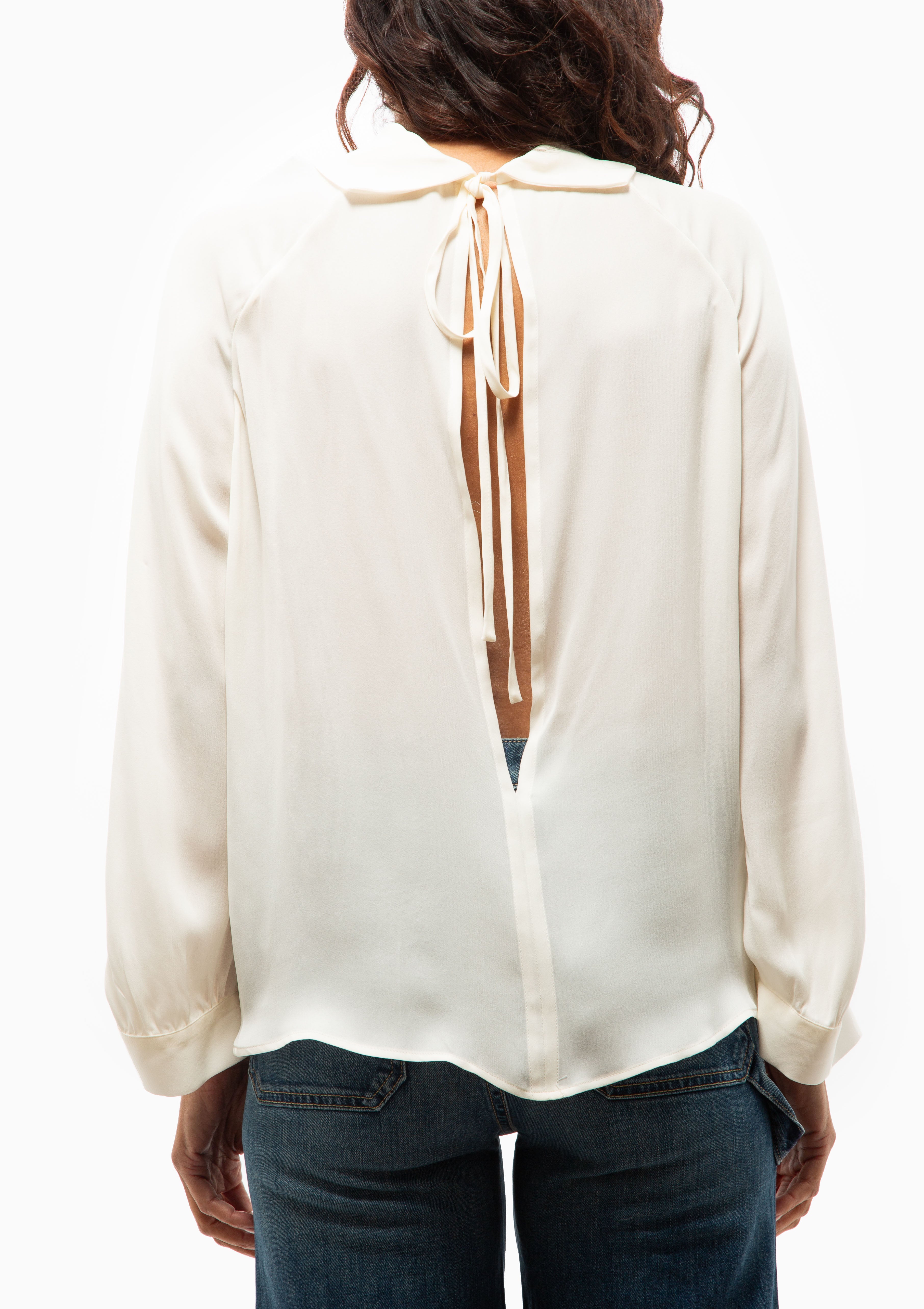 Back view of the Nili Lotan Eliana Top in Ivory. Available at Diani.
