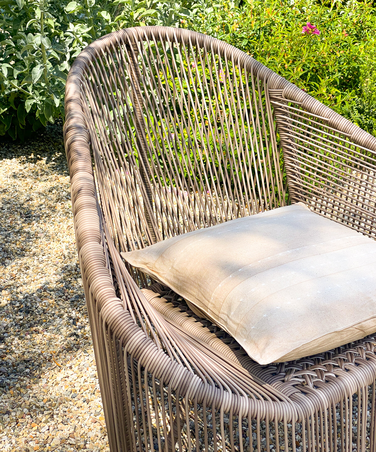 Elegant and minimal, this 20" x 20" cushion in Sunkissed Pebble features tonal stripes and natural cotton texture, made exclusively for Diani Boutique.