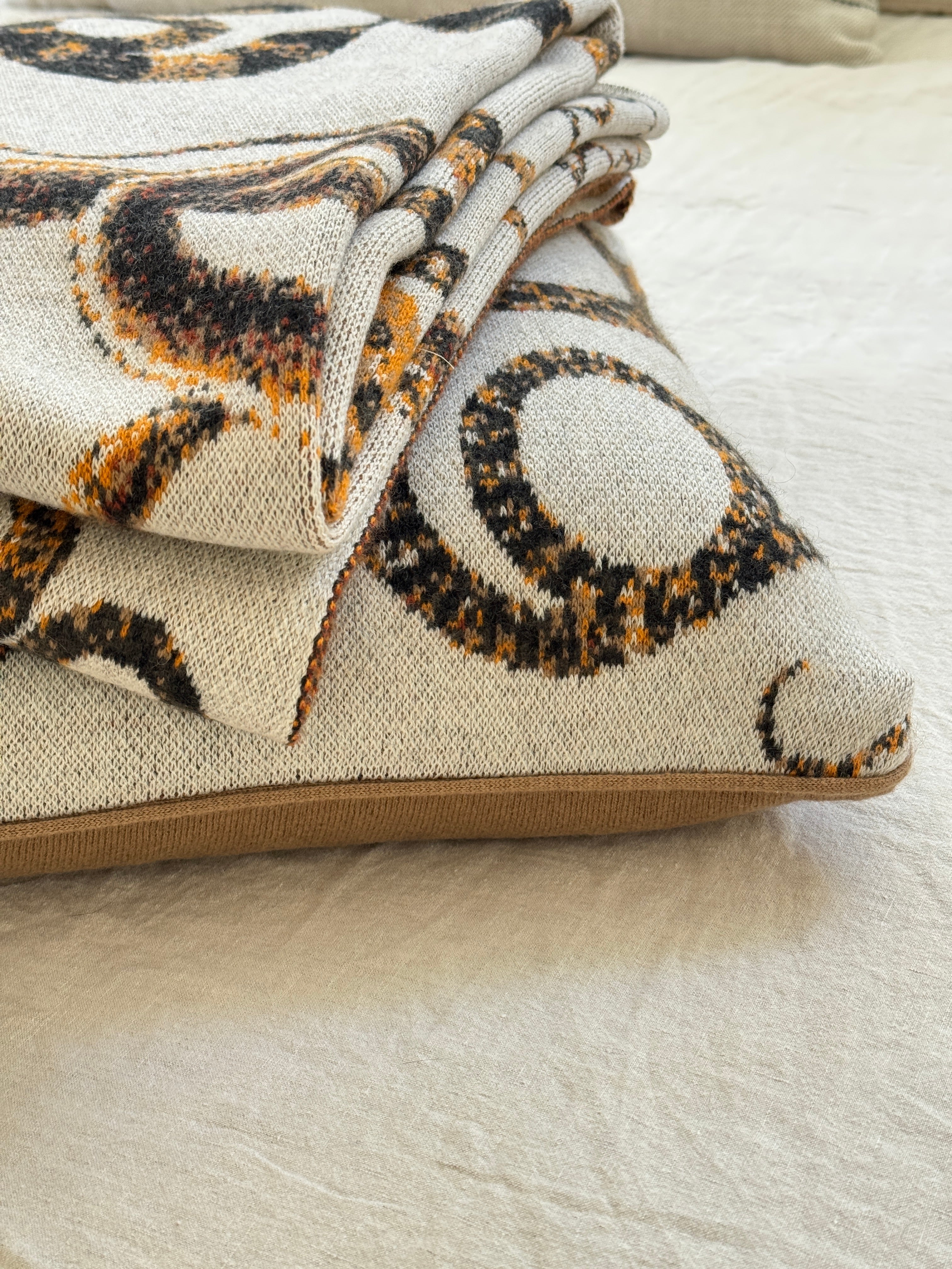 SAVED NY Serpents Pillow available at Diani.