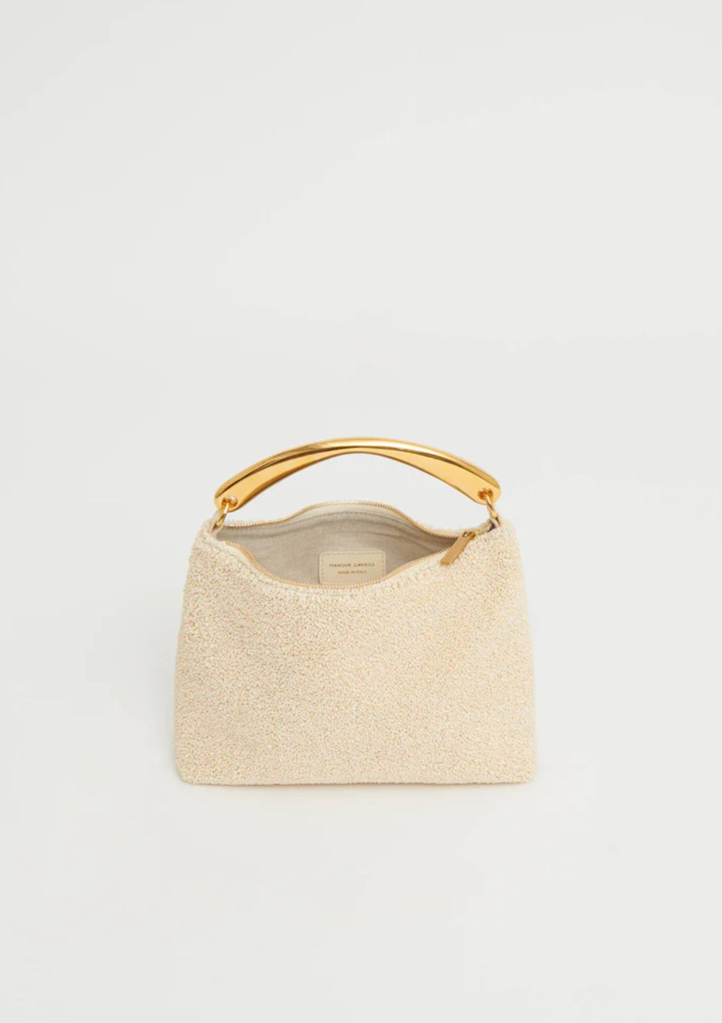 Jasmine yellow Mansur Gavriel Hera Clutch in textured raffia, shown with sculptural gold-tone metal handle; available at Diani, combining natural materials with elegant, modern design