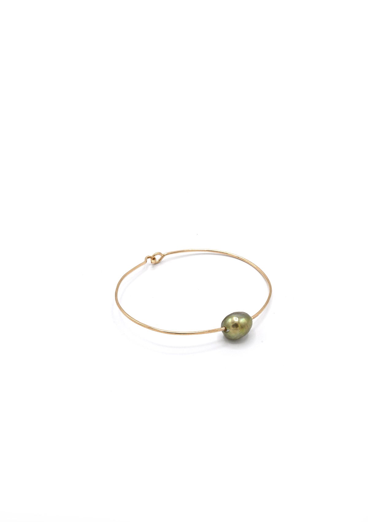 Baroque pearl cuff bracelet by Mary MacGill. Available at Diani.