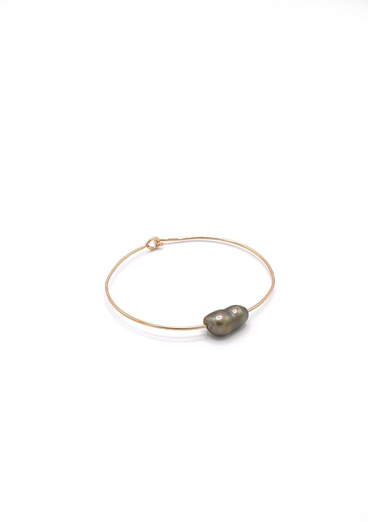 Baroque pearl cuff bracelet by Mary MacGill. Available at Diani.
