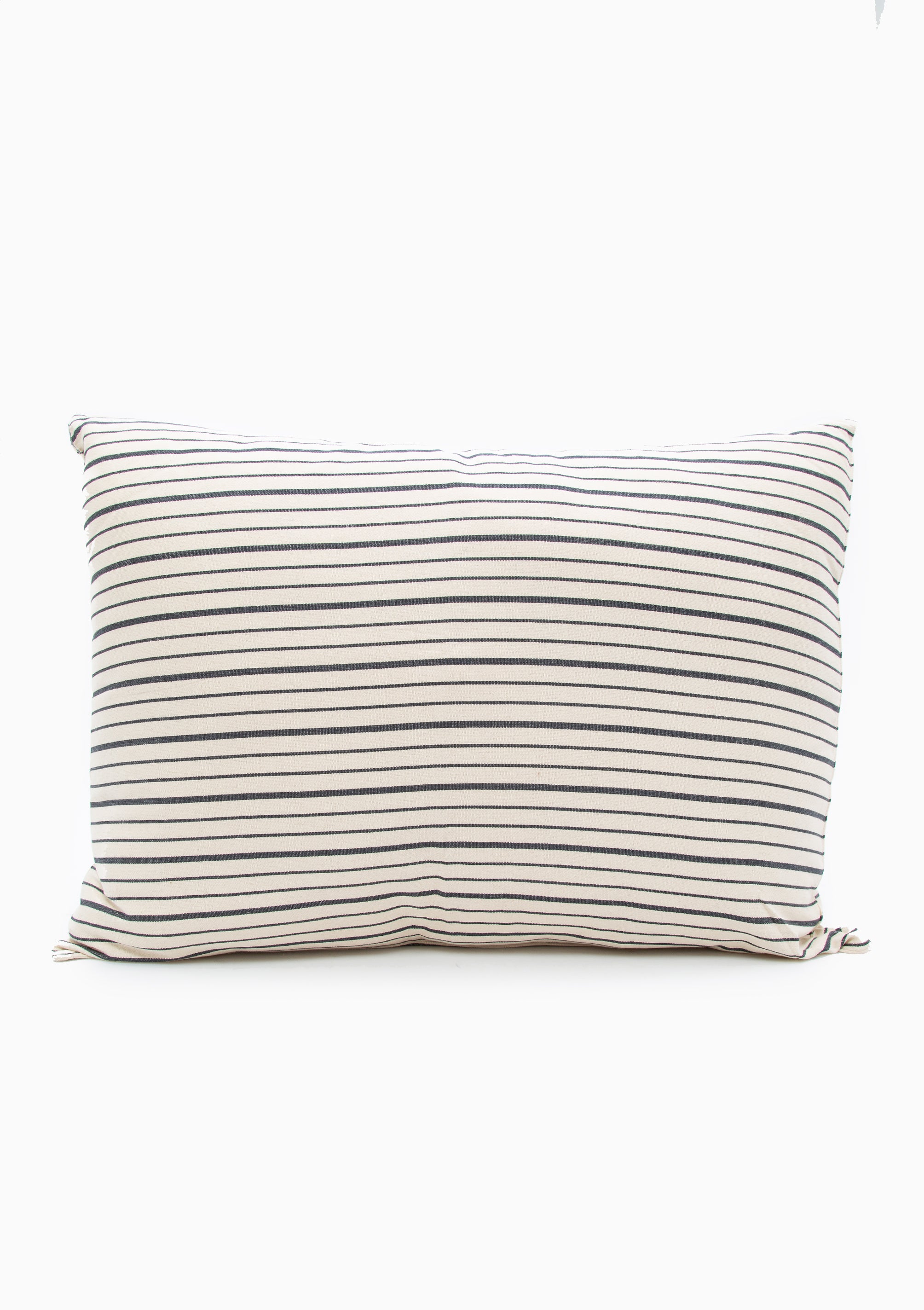 Striped cotton headboard cushion from Tensira, sustainably made in Guinea by artisan groups using zero-waste practices.