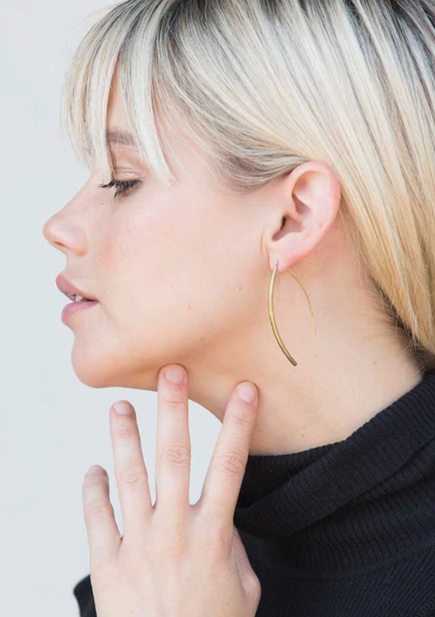 Soko Petite Bow Earrings in Gold, available at Diani.