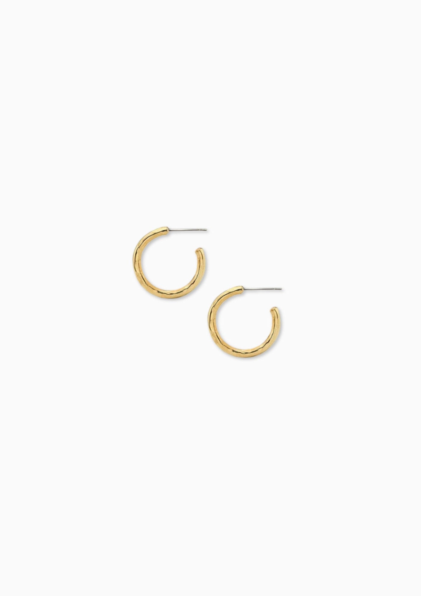 Small Hammered Hoop Earrings in Gold by Soko, available at Diani.
