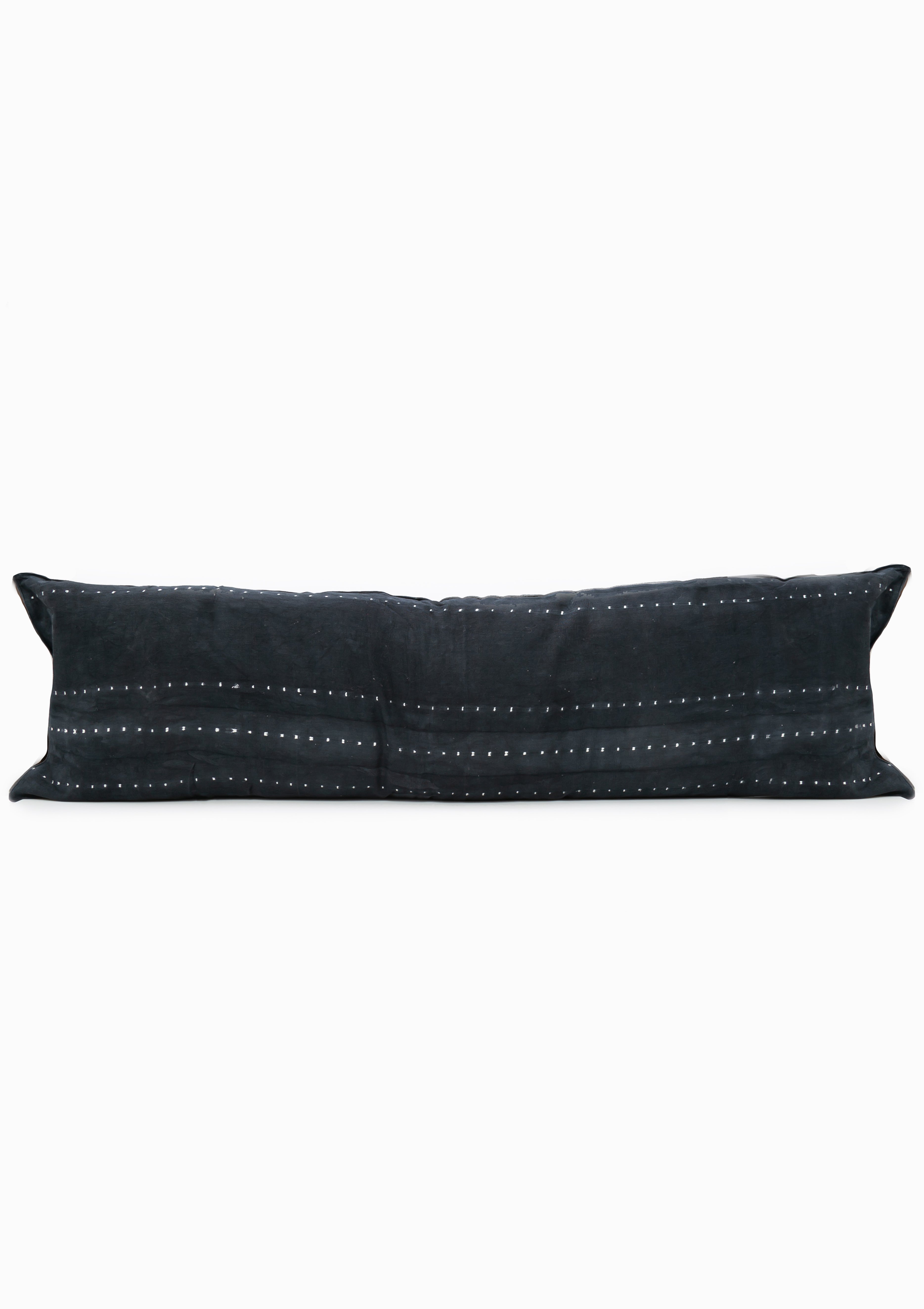 14" x 48" bolster pillow in navy dot batik, handcrafted from 100% cotton with traditional resist-dyeing techniques—exclusive to Diani Boutique.