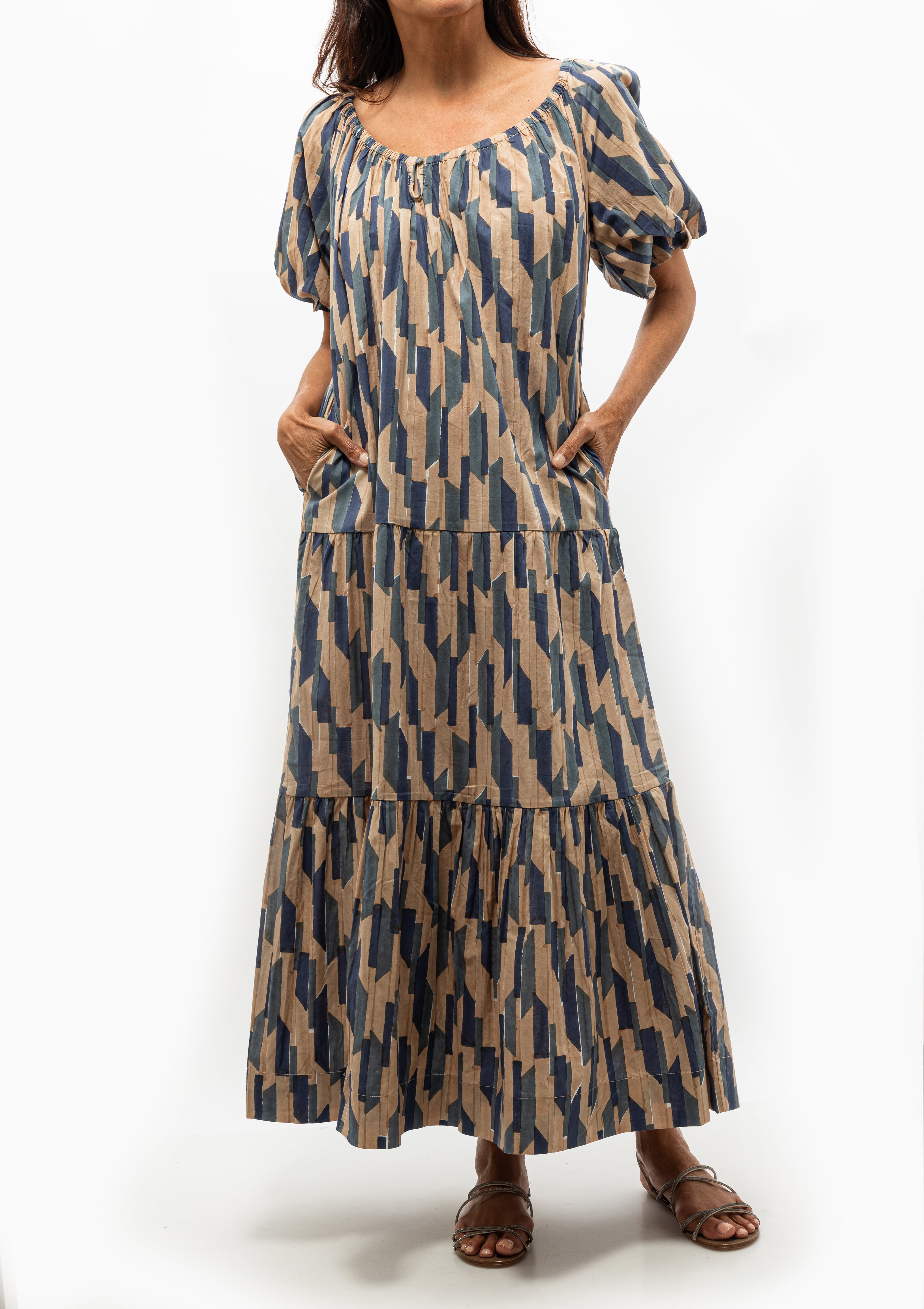 Romantic and versatile, the Mirth Capri Dress in Cerulean Rainfall is effortless fashion. Available at Diani Boutique.