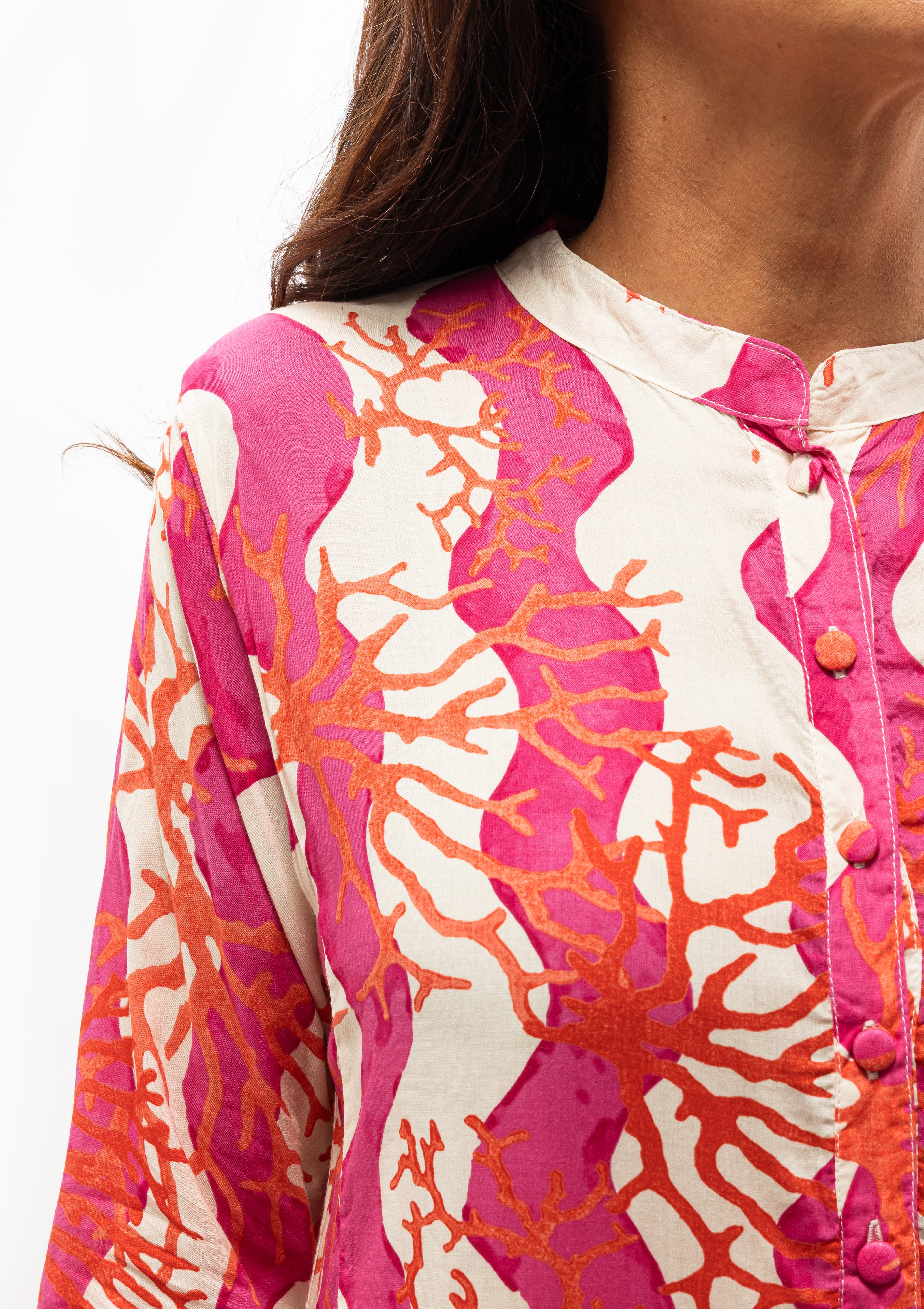 Isobel Dress in Coral Wave Fuchsia by Natalie Martin, available now at Diani Boutique.