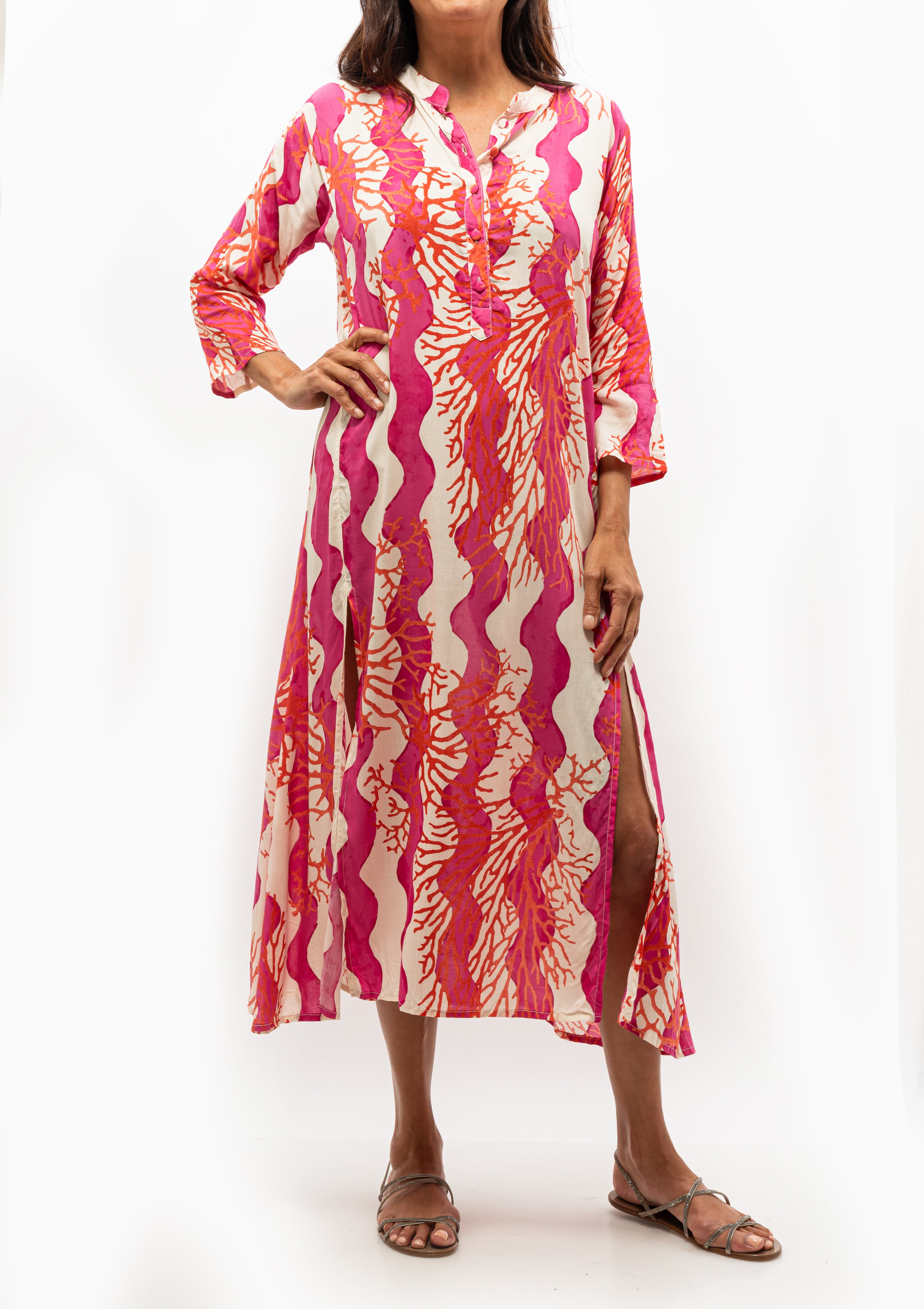 Flowy, fuchsia and coral patterned Isobel Dress by Natalie Martin, shown with the Pedro Garcia Panie Sandal in Black, available at Diani Boutique.
