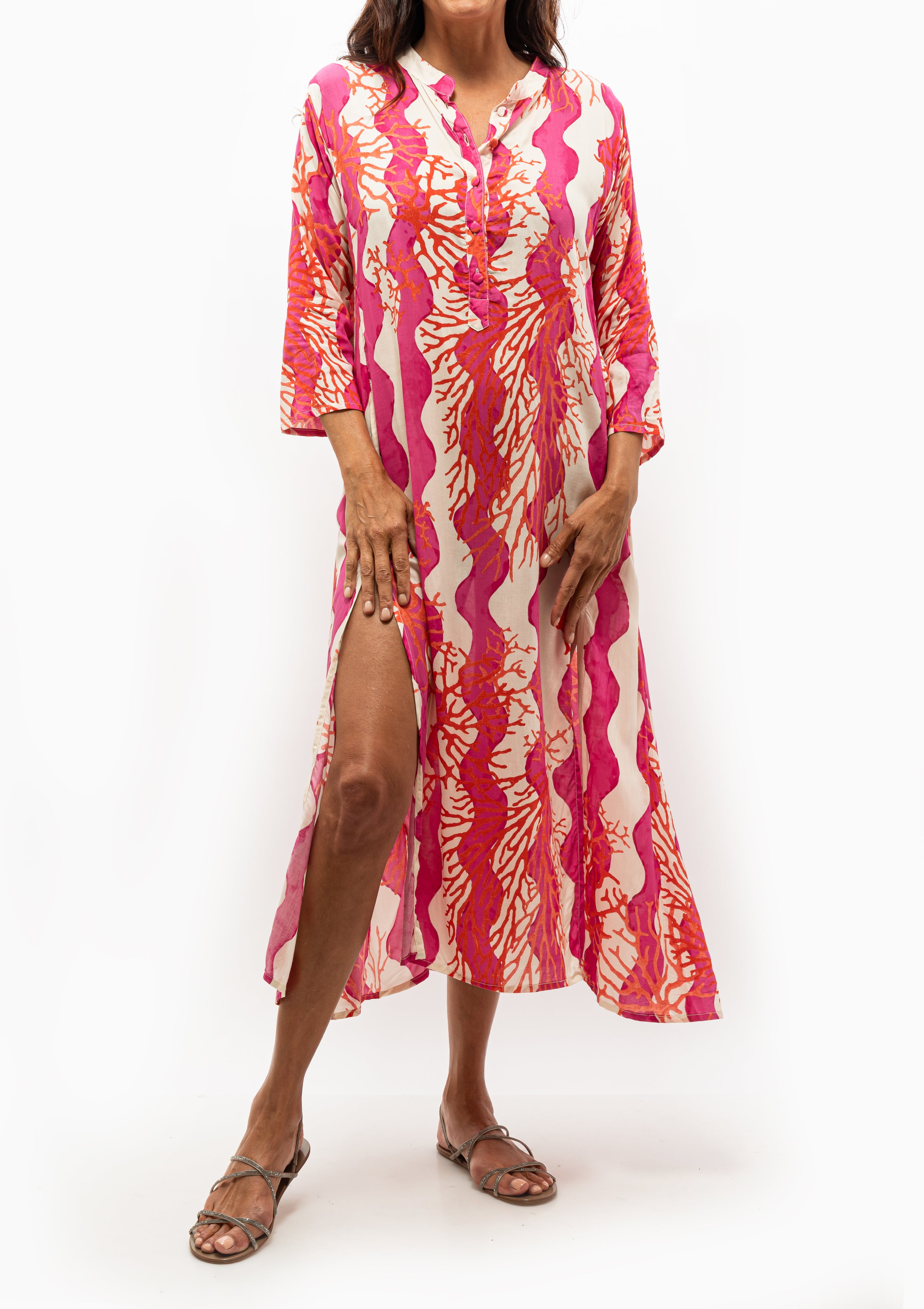 Isobel Dress by Natalie Martin in Coral Wave Fuchsia print, available at Diani Boutique.