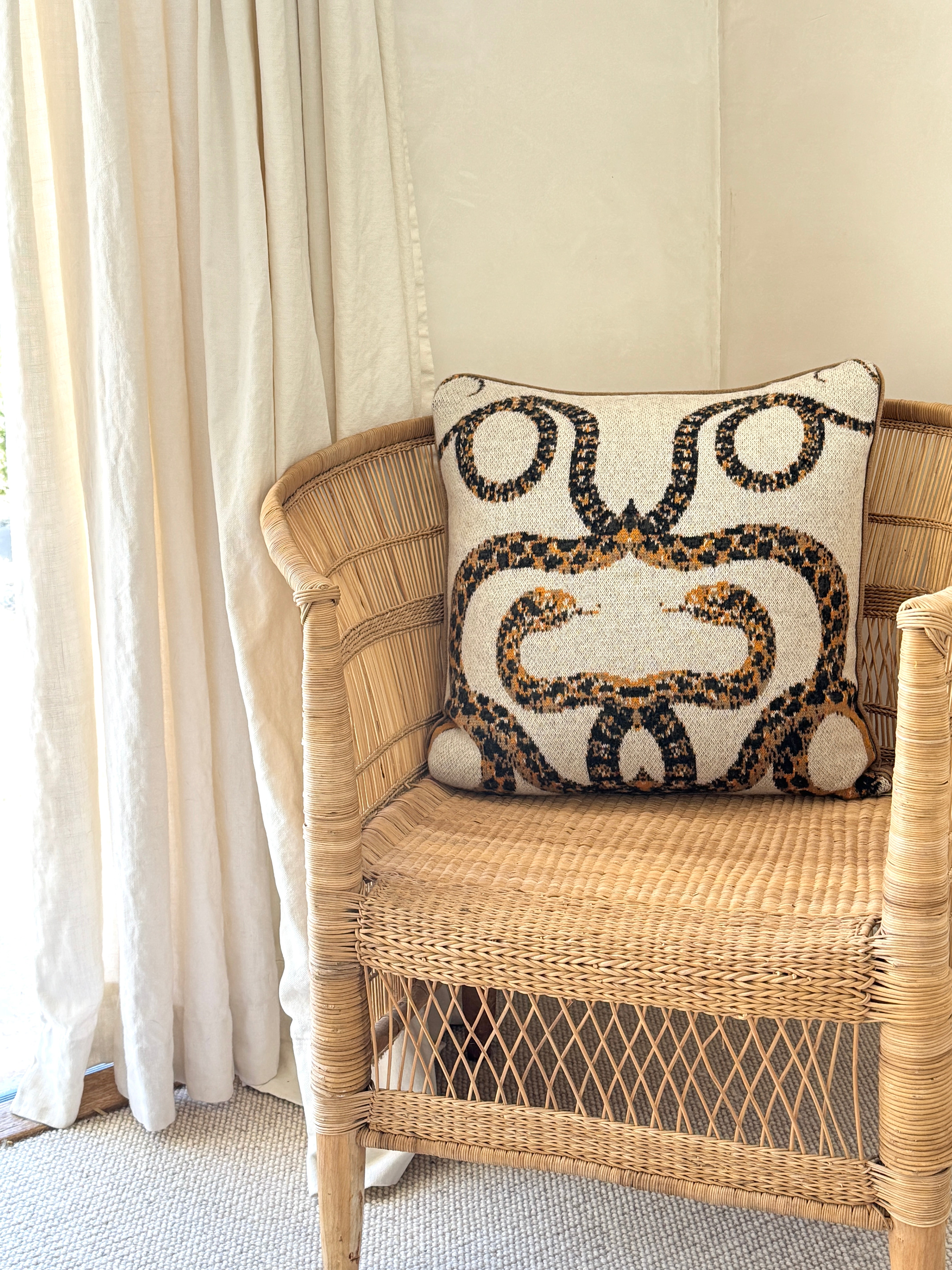 SAVED NY Serpents Pillow available at Diani.