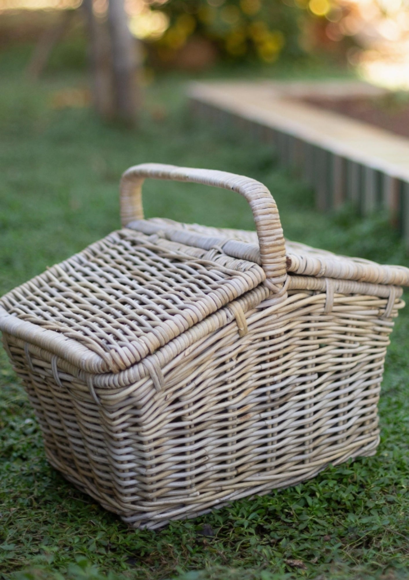 Plan your next picnic with this Rattan picnic basket, available at Diani.