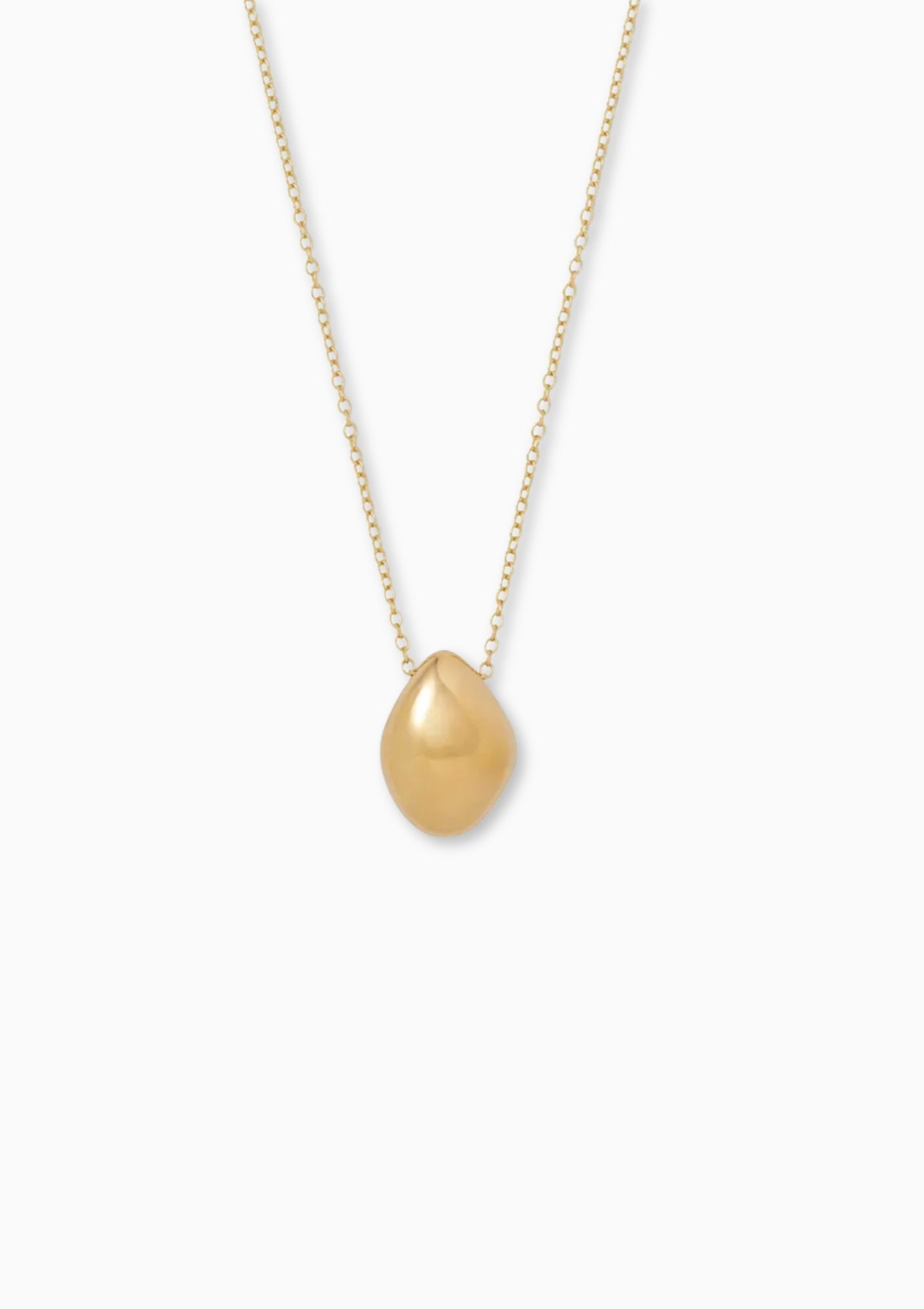 Soko Jiwe Gold Pendant Necklace. Available at Diani.